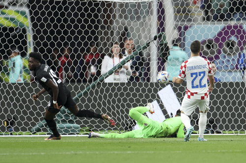 Alphonso Davies of Canada celebrates after scoring their team's first goal during the FIFA World Cup Qatar 2022 Group F match between Croatia and Canada at Khalifa International Stadium on November 27, 2022 in Doha, Qatar.